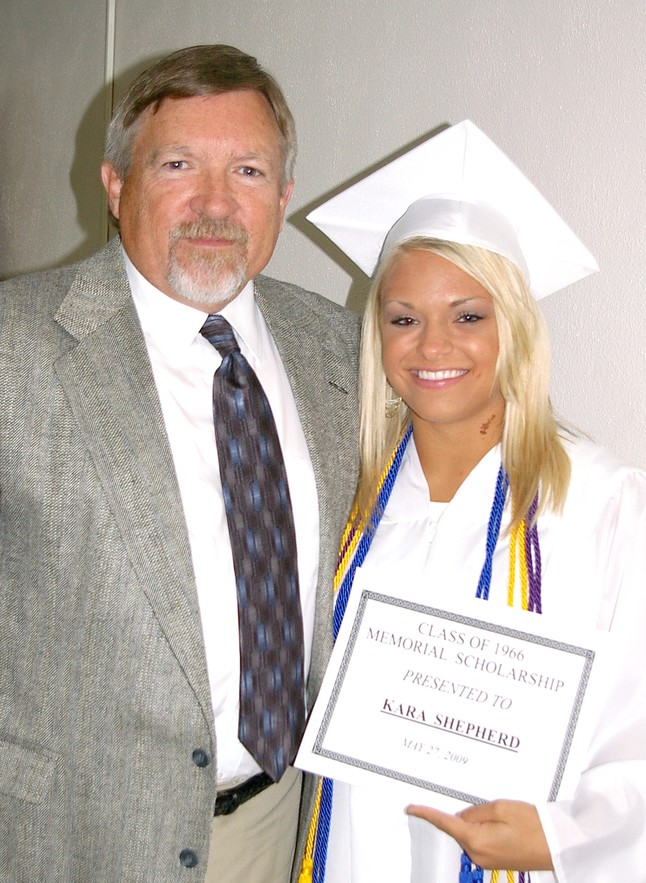 Steve Lewis presents scholarship to Kara Sheperd